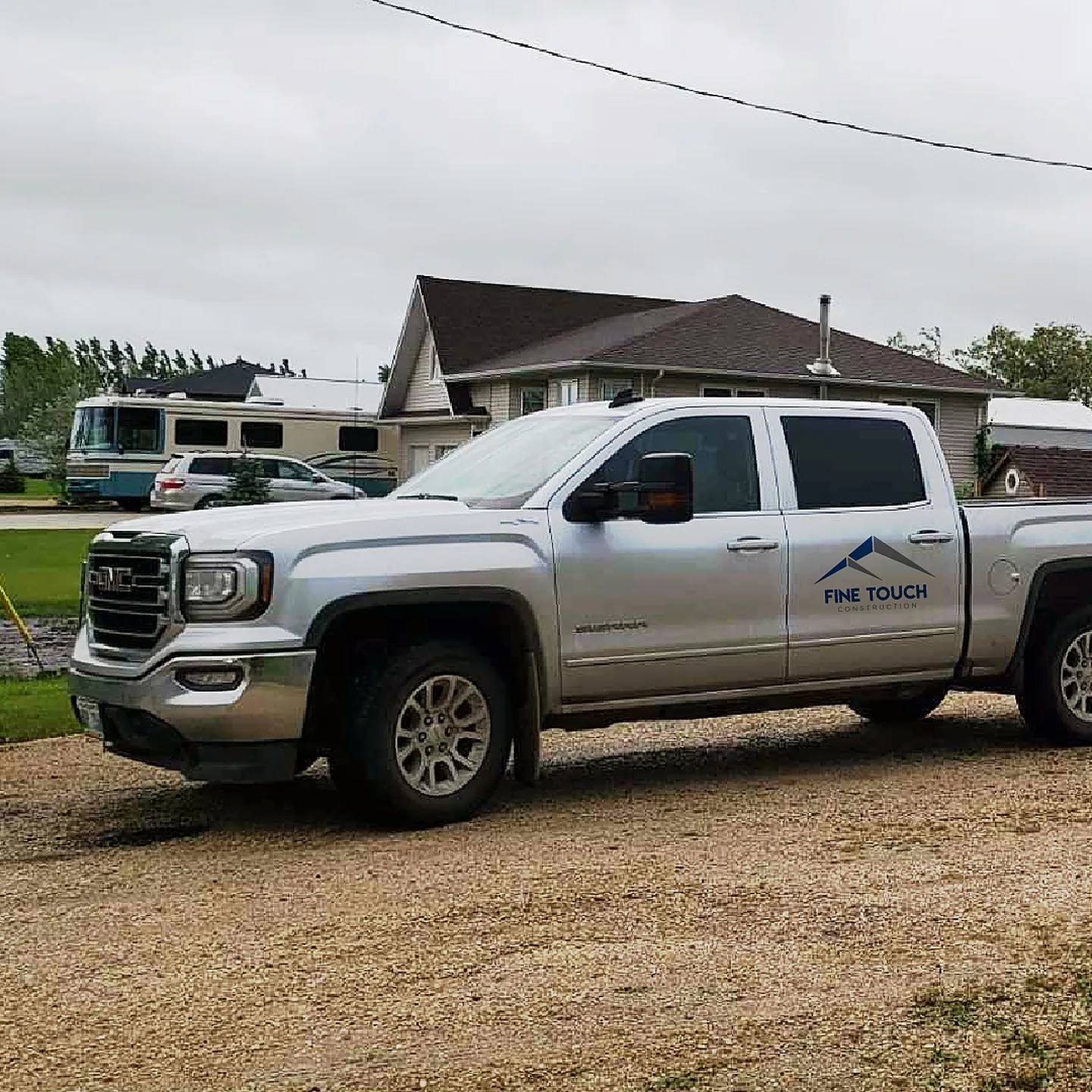 Fine Touch Construction branded pickup truck