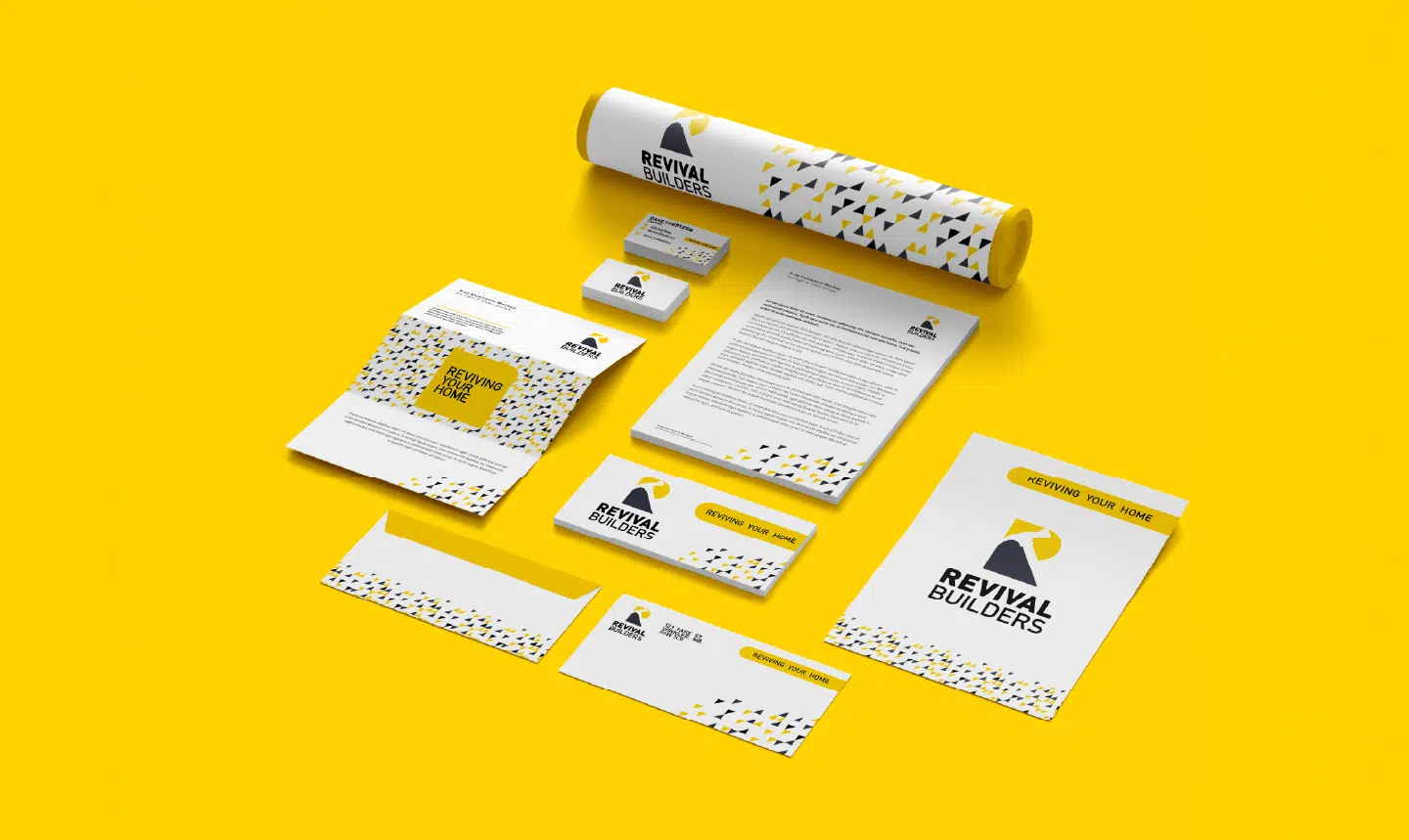 Revival Builders stationery mockups on a yellow background