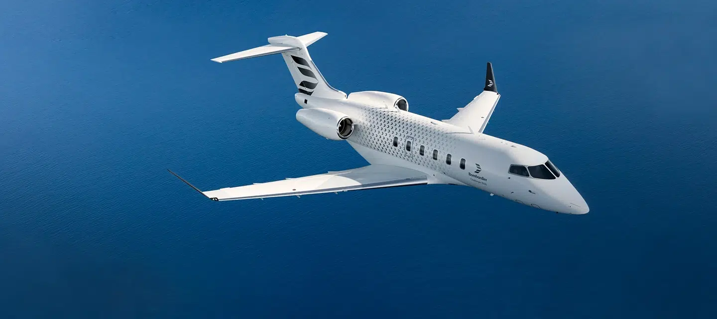 Avion private jet in a clear blue sky